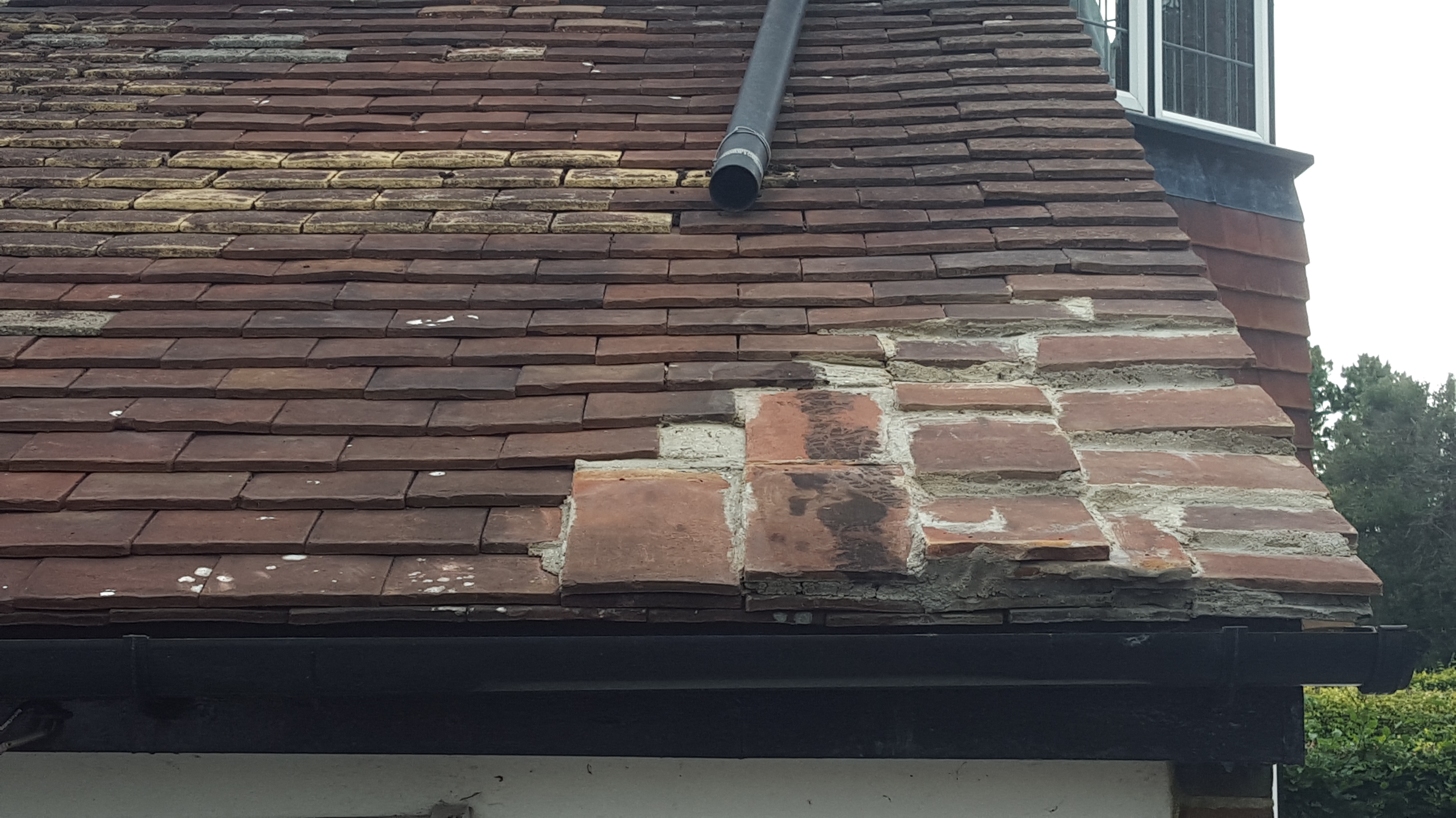 A Perfect Example of When NOT To Cement Tiles - Watchdog Roofing Projects
